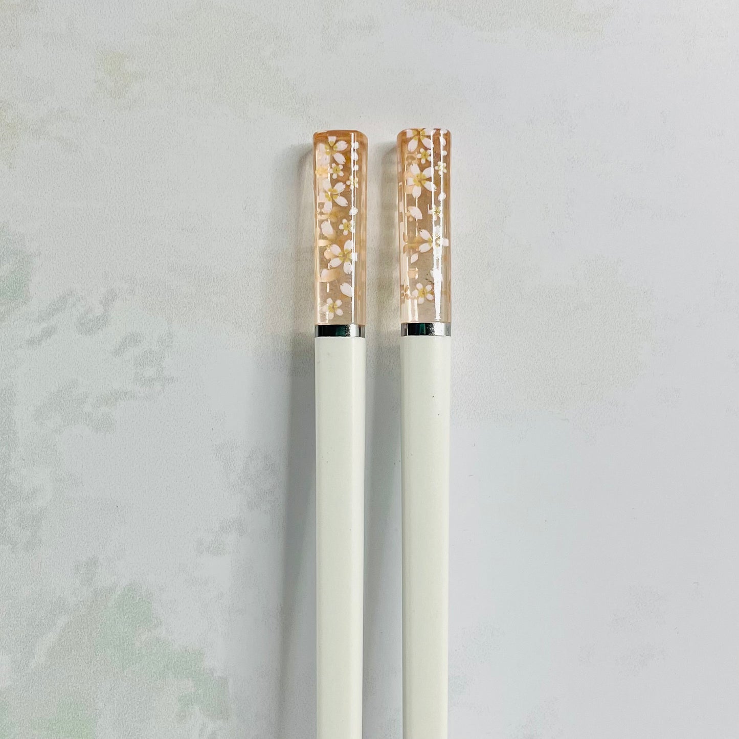 Par de palillos blanco