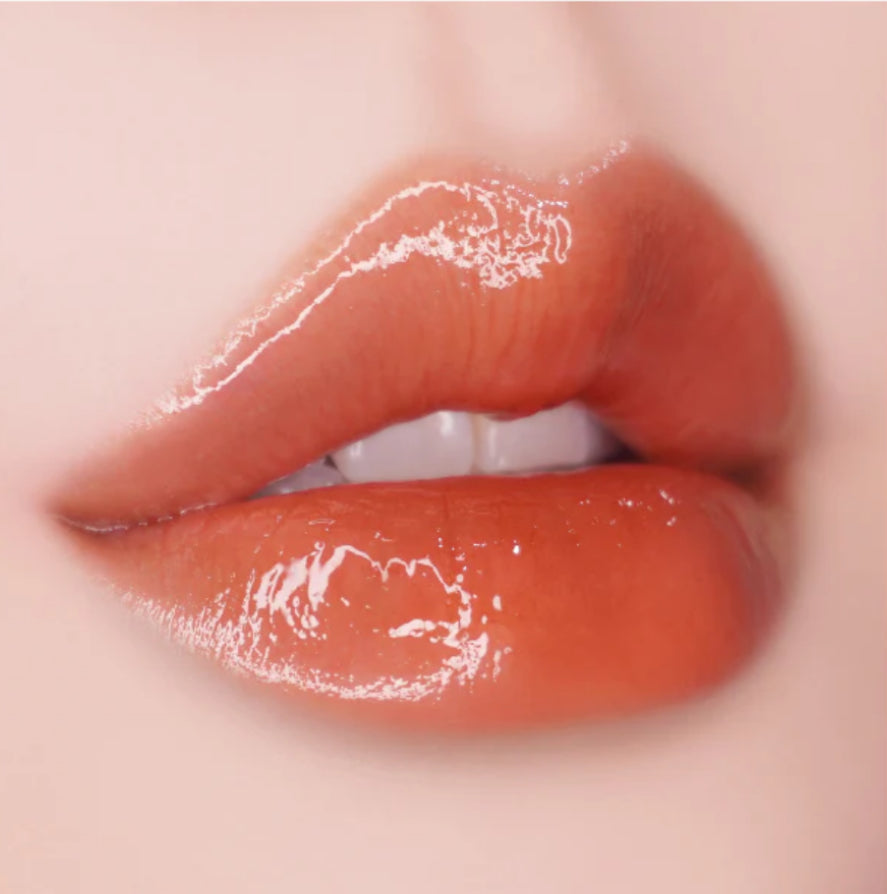 Unleashia Sisua - Popcorn Lip Plumper No.2 Mango Caramel