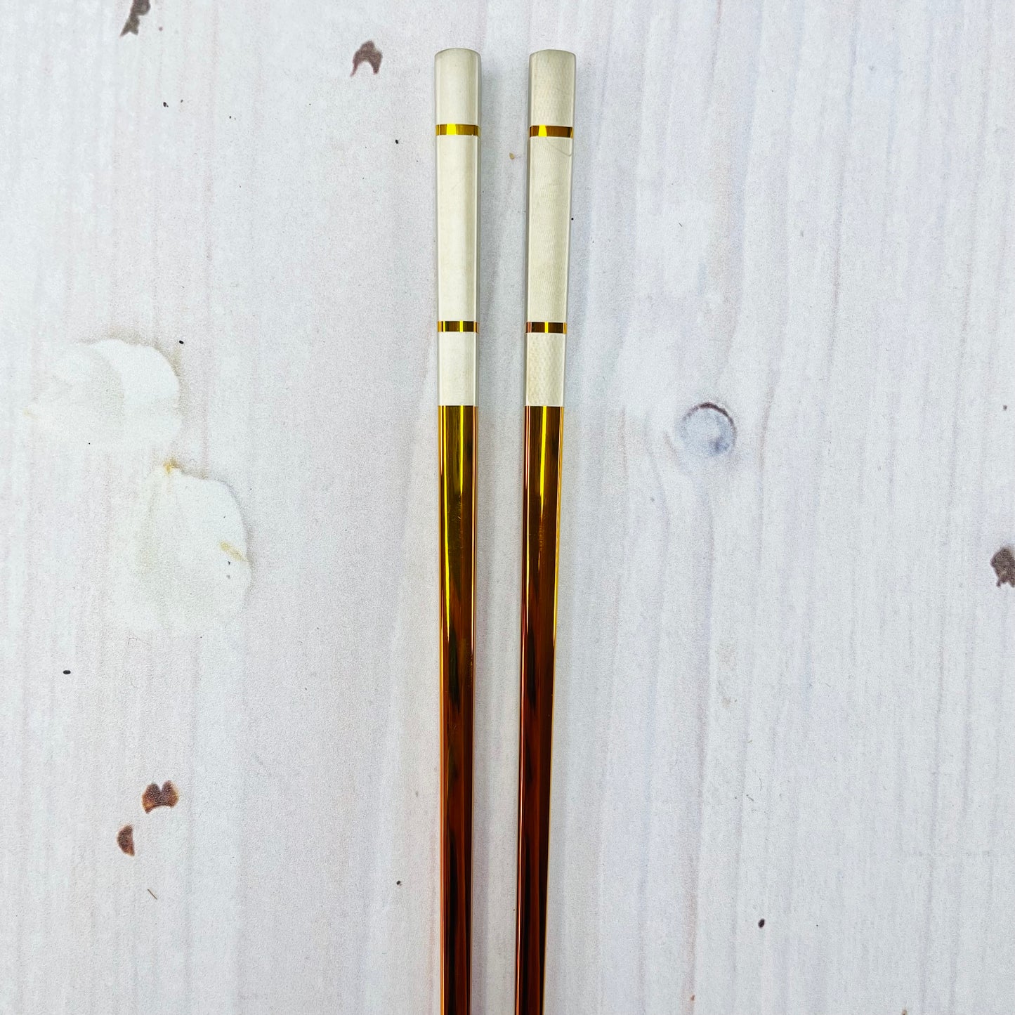 Par de palillos tonasol (acero inoxidable)