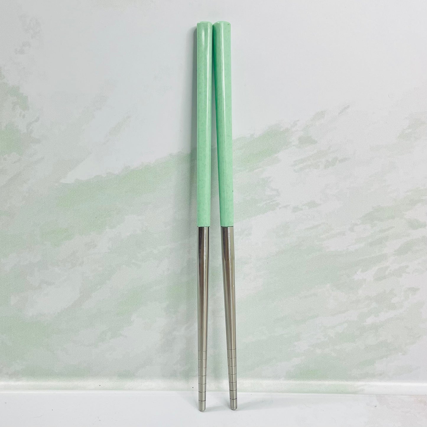 Par de palillos verde&plateado