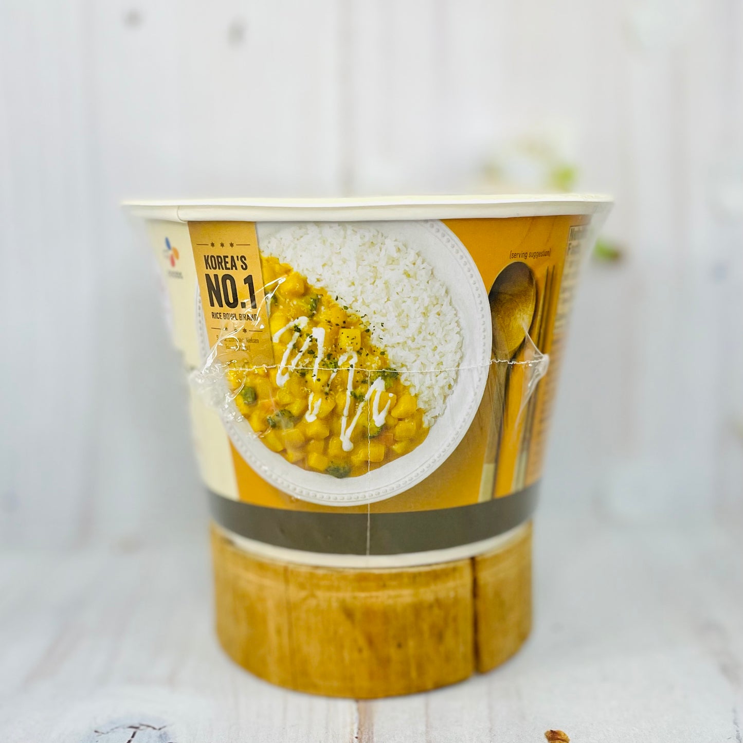 Cooked white rice with creamy yellow curry sauce