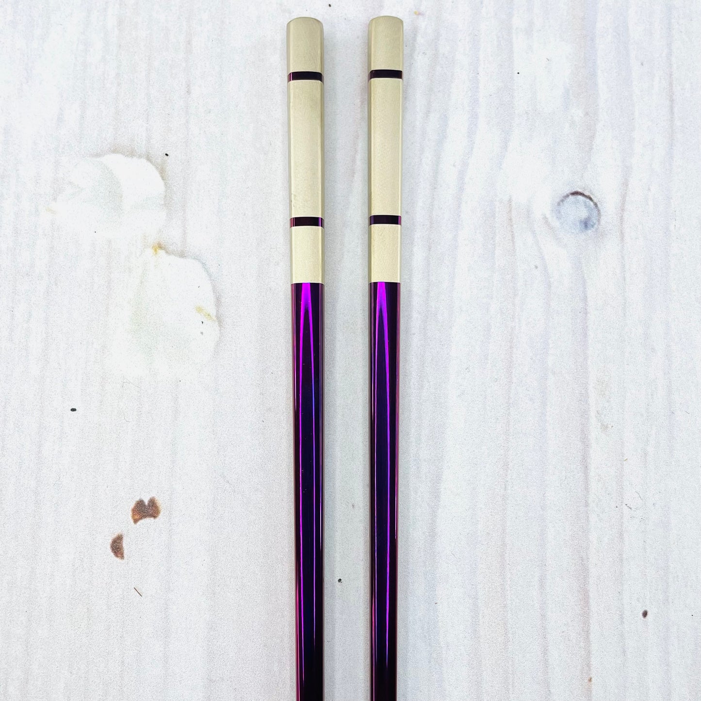 Par de palillos morado (acero inoxidable)